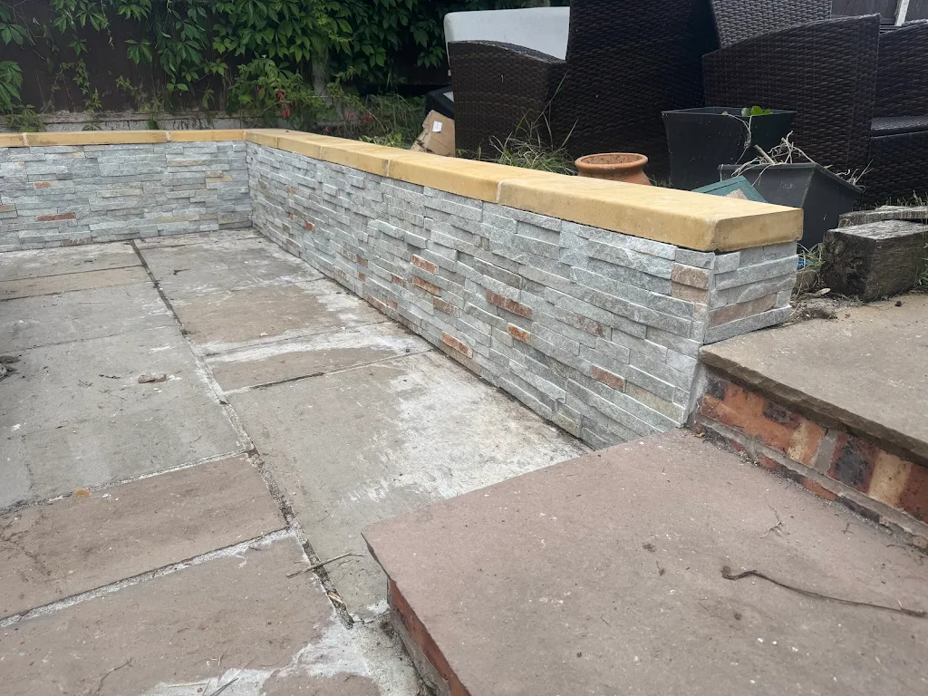 Split faced tiling with coping stone