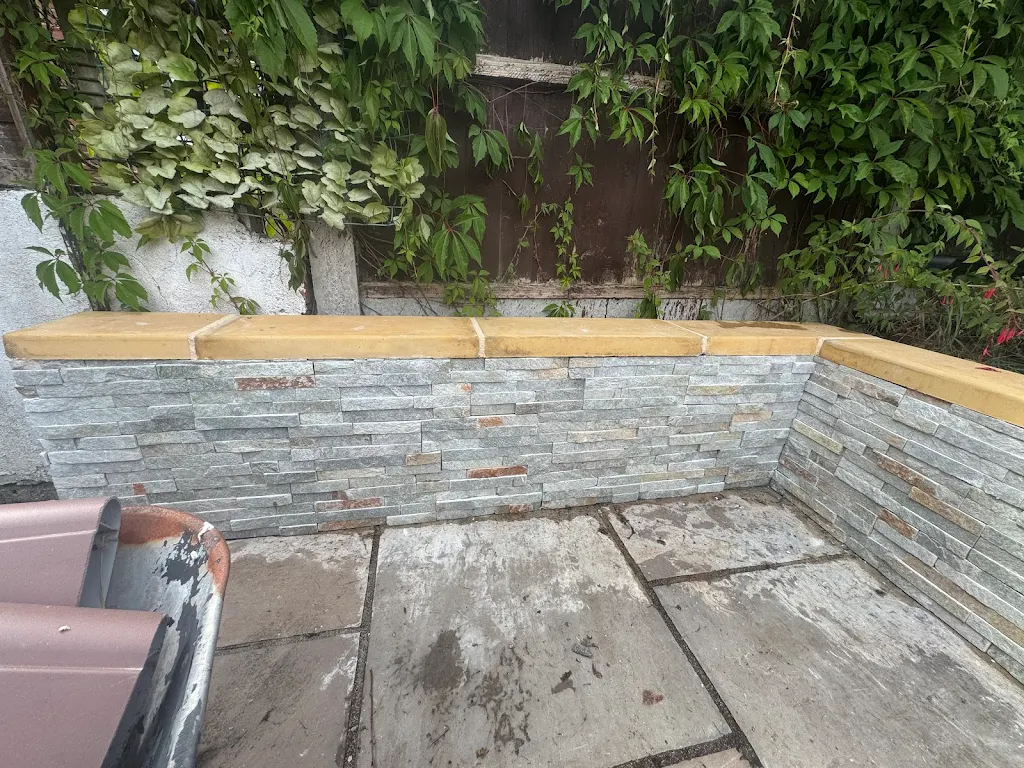 Split faced tiling with coping stone